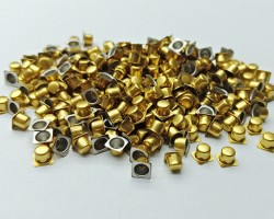 Small accessories coated in gold color Small accessories coated in gold color