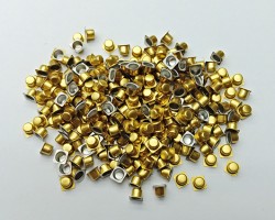 Small accessories coated in gold color Small accessories coated in gold color