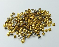 Small accessories coated in gold color Small accessories coated in gold color