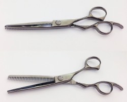 Hair scissors coated with PVD Titanium Black. Hair scissors coated with PVD Titanium Black.